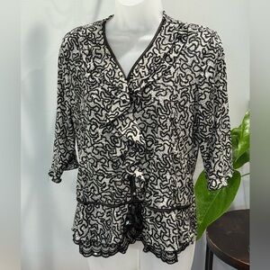 Stretchy Black & White patterned Ruffle Blouse Size M